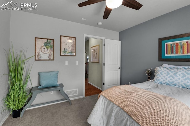 8795 Canary Cir, Colorado Springs, CO 80908 - bedroom with carpet, baseboards, and a ceiling fan