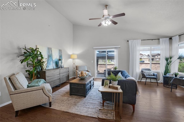 8795 Canary Cir, Colorado Springs, CO 80908 - living area with lofted ceiling, a ceiling fan, wood finished floors, and baseboards