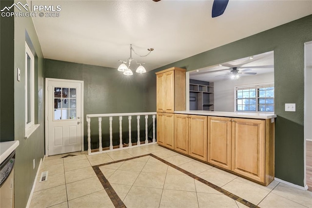 4708 Sprucewood Dr, Colorado Springs, CO 80918 - unfurnished dining area with ceiling fan, baseboards, a chandelier, and inlaid floor details
