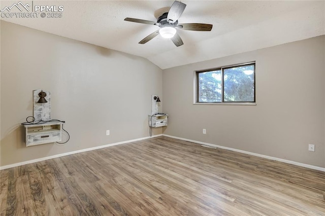 4708 Sprucewood Dr, Colorado Springs, CO 80918 - unfurnished room featuring lofted ceiling, ceiling fan, wood finished floors, and baseboards
