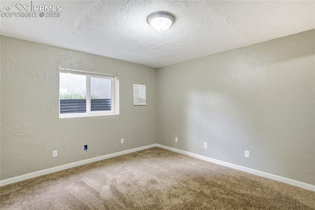 4708 Sprucewood Dr, Colorado Springs, CO 80918 - unfurnished room with carpet flooring, baseboards, a textured ceiling, and a textured wall