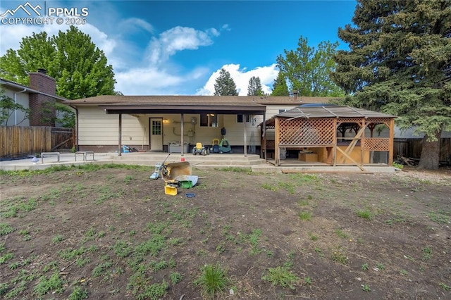 4708 Sprucewood Dr, Colorado Springs, CO 80918 - rear view of property featuring a patio