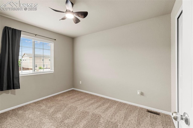 7315 Forest Meadows Ave, Colorado Springs, CO 80908 - spare room featuring carpet floors, baseboards, and ceiling fan