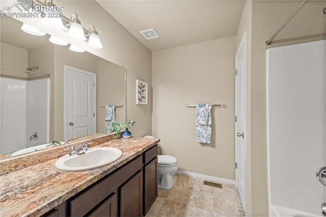 7315 Forest Meadows Ave, Colorado Springs, CO 80908 - bathroom featuring vanity, toilet, and shower / bath combination