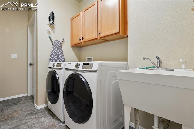 15506 Short Line Ct, Monument, CO 80132 - laundry area featuring washer and dryer, cabinet space, and baseboards