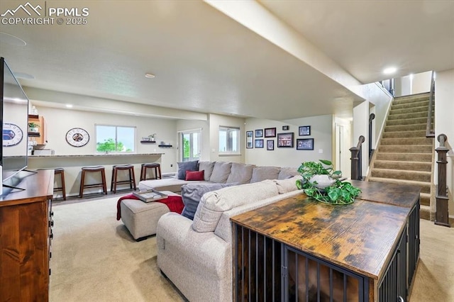 15506 Short Line Ct, Monument, CO 80132 - living area with light carpet and stairway