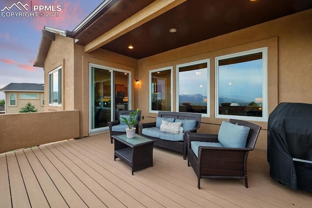 15506 Short Line Ct, Monument, CO 80132 - deck featuring an outdoor living space and a grill