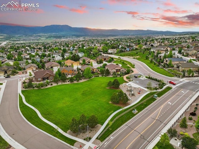 15506 Short Line Ct, Monument, CO 80132 - aerial view at dusk of a mountain view and a residential view