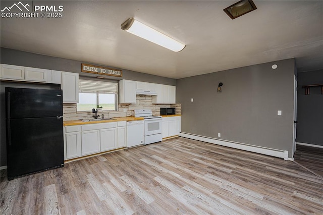 9940 N Calhan Hwy, Calhan, CO 80808 - kitchen with black appliances, a sink, wood counters, a baseboard radiator, and white cabinets