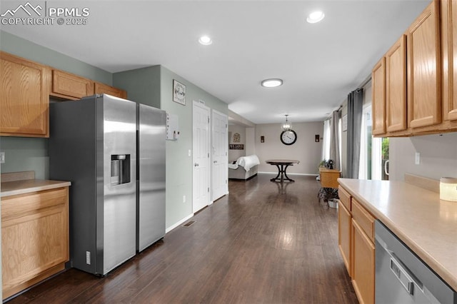 12206 Crystal Downs Rd, Peyton, CO 80831 - kitchen featuring appliances with stainless steel finishes, light countertops, dark wood-style floors, and recessed lighting