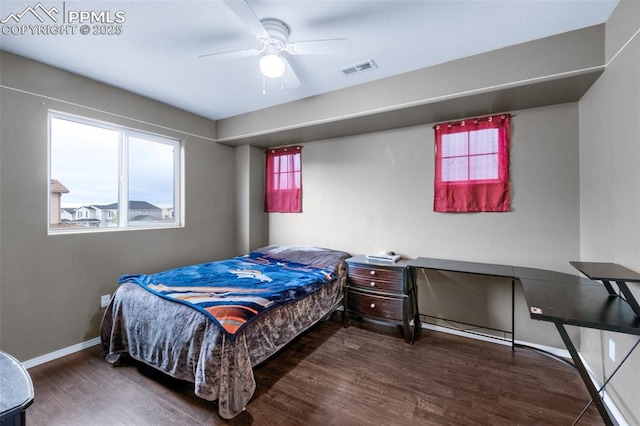 12206 Crystal Downs Rd, Peyton, CO 80831 - bedroom featuring wood finished floors, baseboards, and a ceiling fan