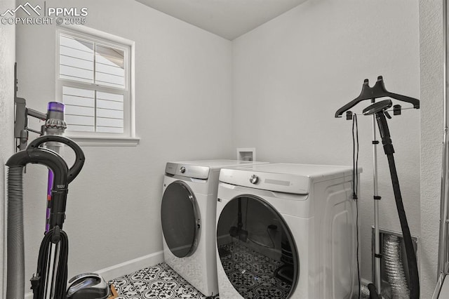5446 Coltin Trl, Castle Rock, CO 80104 - laundry room with independent washer and dryer, baseboards, and tile patterned floors