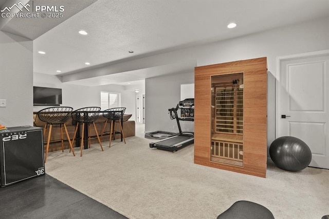 5446 Coltin Trl, Castle Rock, CO 80104 - exercise area with recessed lighting, a textured ceiling, and carpet floors