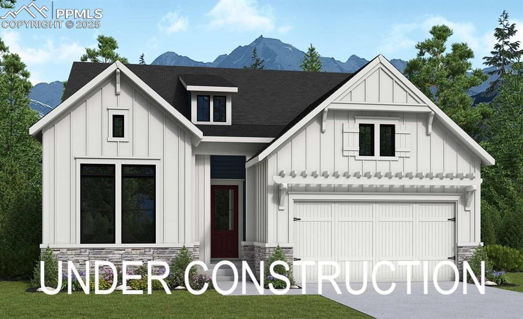 17370 Alsike Clover Ct, Monument, CO 80132 - view of front facade with board and batten siding, stone siding, and concrete driveway