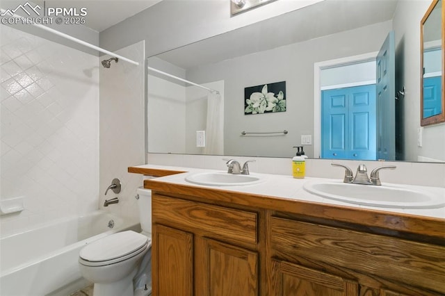 7942 French Rd, Colorado Springs, CO 80920 - bathroom featuring toilet, double vanity, and shower / tub combo