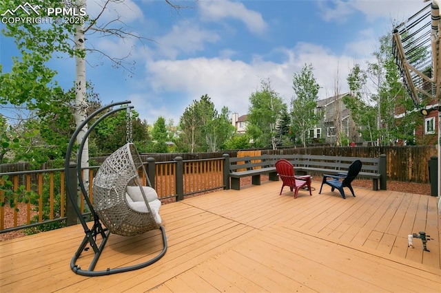 7942 French Rd, Colorado Springs, CO 80920 - wooden terrace with a fenced backyard