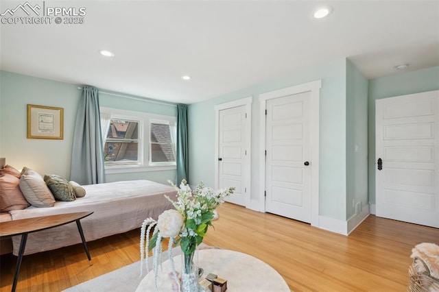 1212 W Cucharras St, Colorado Springs, CO 80904 - bedroom featuring light wood-type flooring, recessed lighting, and baseboards