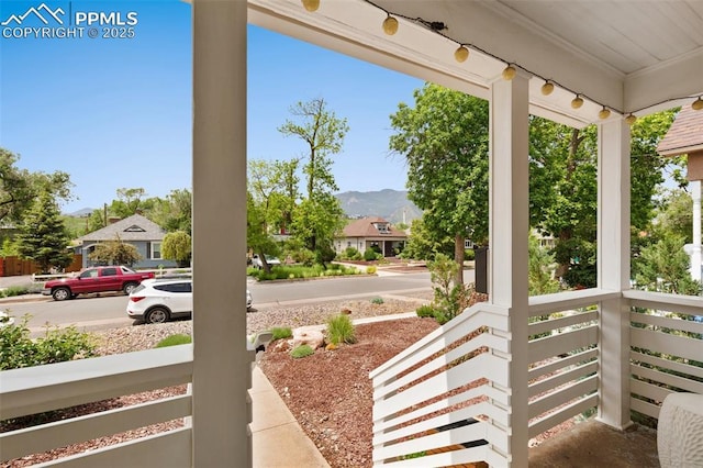1212 W Cucharras St, Colorado Springs, CO 80904 - porch featuring a mountain view