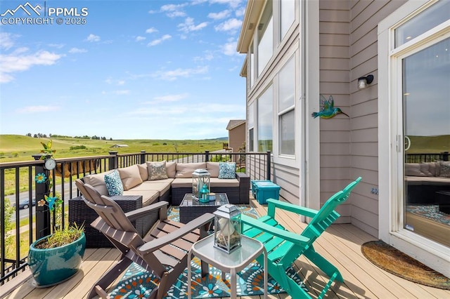 6950 Blue Mesa Ln, Littleton, CO 80125 - wooden deck featuring an outdoor living space