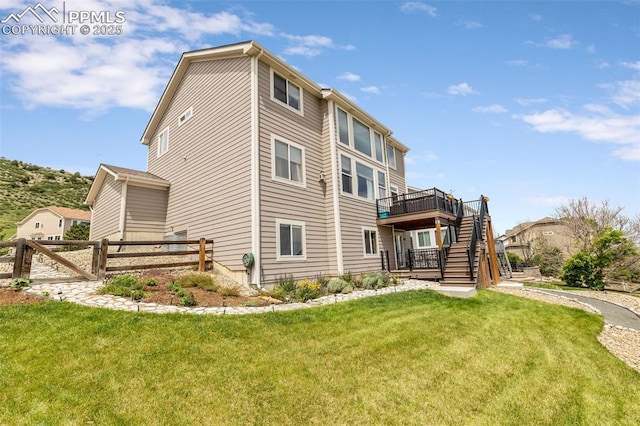 6950 Blue Mesa Ln, Littleton, CO 80125 - back of property with stairs and a deck