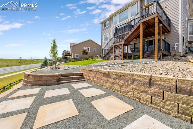 6950 Blue Mesa Ln, Littleton, CO 80125 - view of patio / terrace with stairs and a balcony