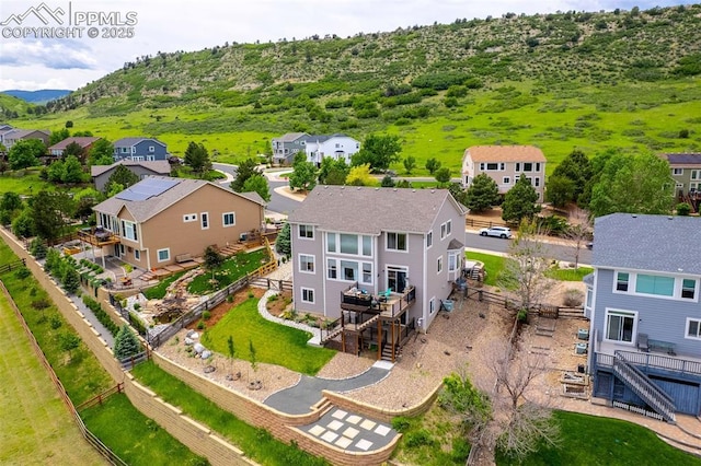 6950 Blue Mesa Ln, Littleton, CO 80125 - aerial view of residential area featuring mountains