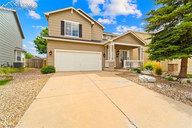 5481 Pioneer Mesa Dr, Colorado Springs, CO 80923 - traditional-style house featuring a porch, concrete driveway, an attached garage, and roof with shingles