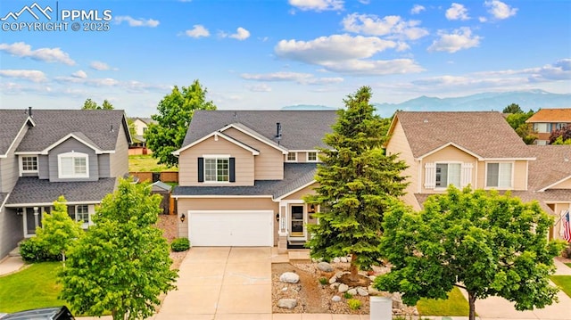 5481 Pioneer Mesa Dr, Colorado Springs, CO 80923 - traditional-style house with concrete driveway, a residential view, a garage, and roof with shingles