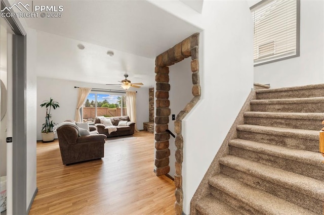 5481 Pioneer Mesa Dr, Colorado Springs, CO 80923 - stairs featuring wood finished floors and ceiling fan