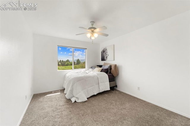 5481 Pioneer Mesa Dr, Colorado Springs, CO 80923 - carpeted bedroom with baseboards and ceiling fan
