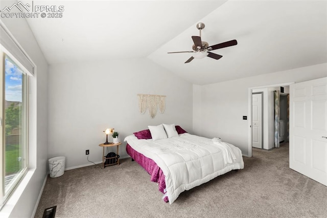 5481 Pioneer Mesa Dr, Colorado Springs, CO 80923 - carpeted bedroom featuring multiple windows, lofted ceiling, and ceiling fan