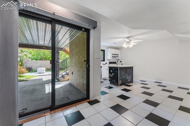 24 Redondo Ln, Pueblo, CO 81005 - doorway to outside featuring a ceiling fan and baseboards