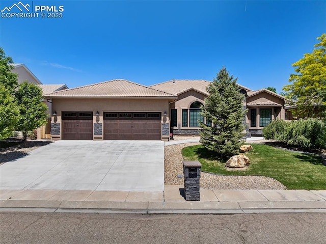 24 Redondo Ln, Pueblo, CO 81005 - ranch-style home featuring a garage, stucco siding, a tiled roof, and driveway