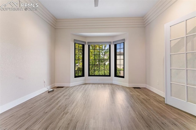 24 Redondo Ln, Pueblo, CO 81005 - empty room featuring wood finished floors and baseboards