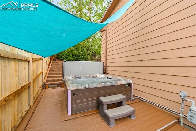 6150 Fall River Dr, Colorado Springs, CO 80918 - wooden terrace featuring a hot tub and stairs