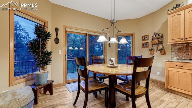17910 Queensmere Dr, Monument, CO 80132 - dining area featuring light wood-style flooring and baseboards