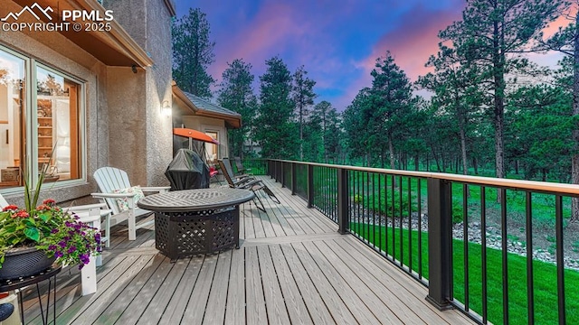 17910 Queensmere Dr, Monument, CO 80132 - wooden terrace with a lawn