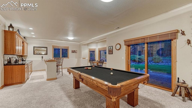 17910 Queensmere Dr, Monument, CO 80132 - playroom featuring light colored carpet, billiards, wet bar, baseboards, and recessed lighting