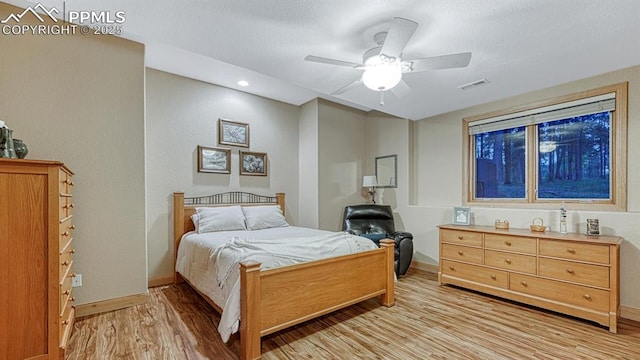 17910 Queensmere Dr, Monument, CO 80132 - bedroom featuring light wood-style flooring, baseboards, and a ceiling fan