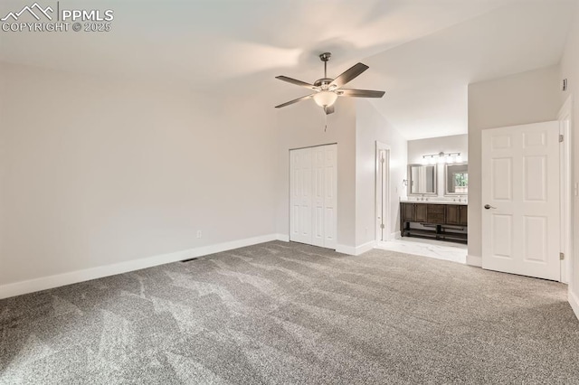 610 E San Gabriel Pl, Colorado Springs, CO 80906 - unfurnished bedroom with carpet floors, baseboards, ceiling fan, and ensuite bath