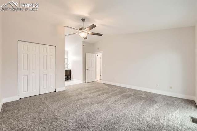 610 E San Gabriel Pl, Colorado Springs, CO 80906 - unfurnished bedroom with carpet, baseboards, a closet, lofted ceiling, and a ceiling fan
