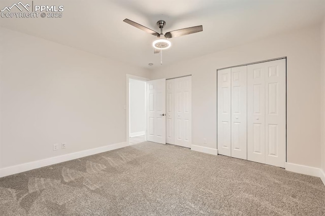 610 E San Gabriel Pl, Colorado Springs, CO 80906 - unfurnished bedroom with two closets, carpet floors, and baseboards
