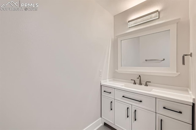 610 E San Gabriel Pl, Colorado Springs, CO 80906 - bathroom featuring vanity and baseboards