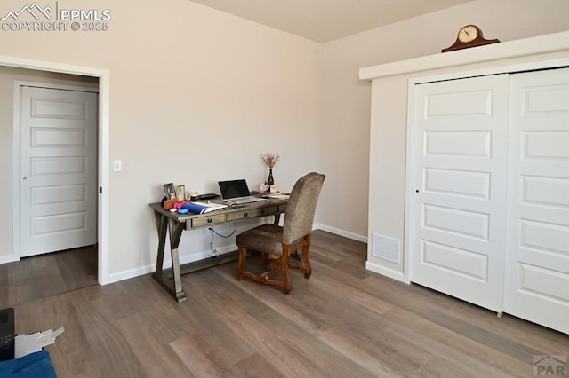 1213 E Tidy Dr, Pueblo, CO 81007 - office featuring wood finished floors and baseboards