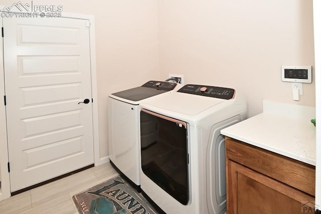 1213 E Tidy Dr, Pueblo, CO 81007 - laundry room with separate washer and dryer and cabinet space