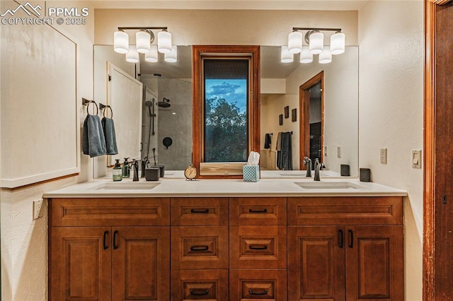5145 Golden Hills Ct, Colorado Springs, CO 80919 - full bath featuring a shower stall, double vanity, and a textured wall