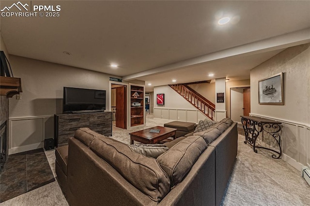 5145 Golden Hills Ct, Colorado Springs, CO 80919 - living room with stairs, carpet, recessed lighting, and a baseboard heating unit