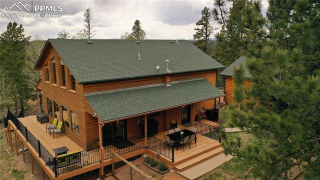 409 Pike View Dr, Divide, CO 80814 - rear view of property with a wooden deck and a shingled roof