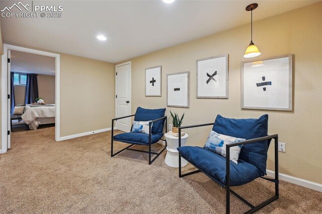 107 N Logan Ave, Colorado Springs, CO 80909 - living area with carpet, baseboards, and recessed lighting
