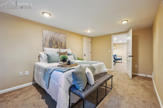 107 N Logan Ave, Colorado Springs, CO 80909 - bedroom with light colored carpet and baseboards